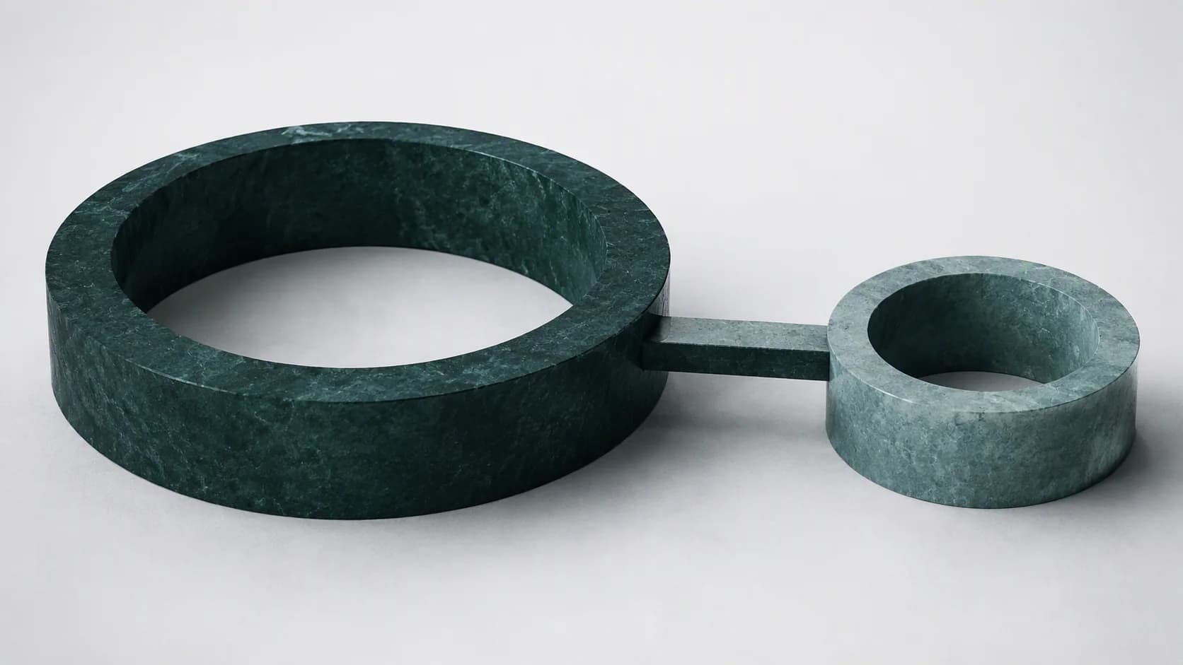 A refined abstract deep-green structure connects to one smaller teal form across a narrow illuminated threshold.